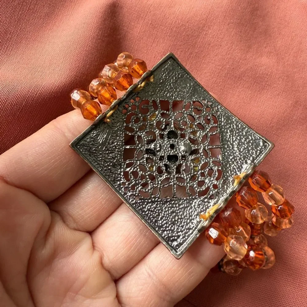 Y2K Multi-stranded Bracelet with a faux Amber Glass, Gems Statement Pendant